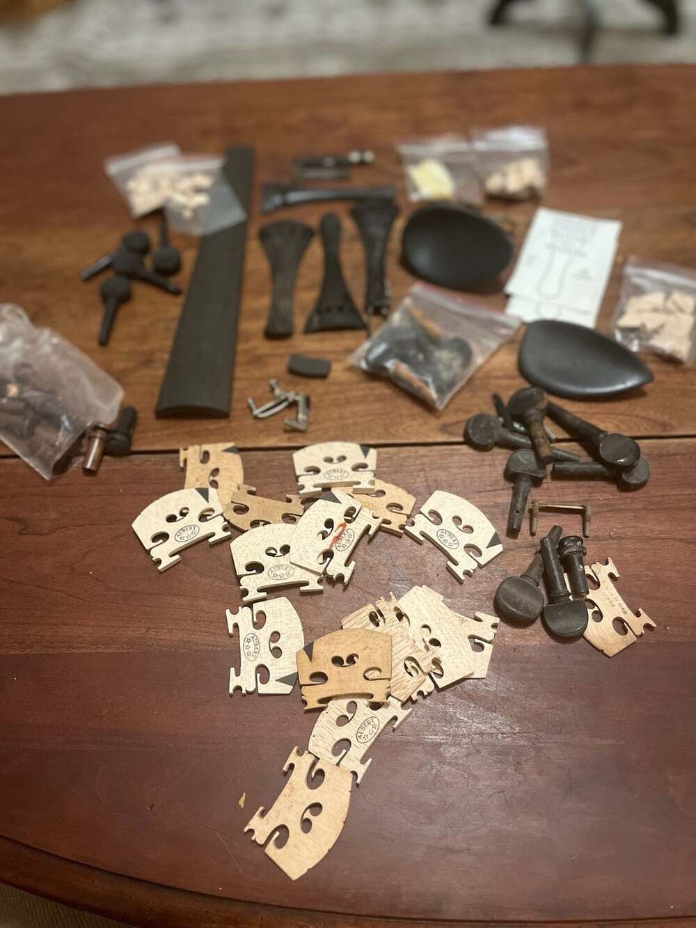 Assorted violin replacement parts